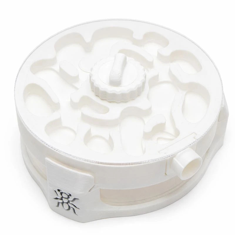 White Avalon Ant Nest formicarium at an angle, showing the maze-patterned chambers through the clear lid and the humidity valve