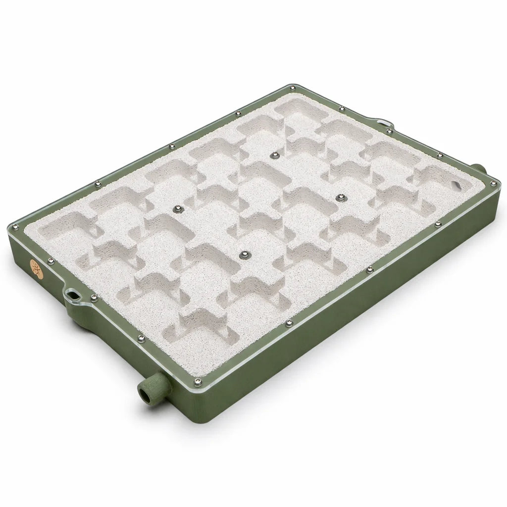 XL Ytong Nest - Type B in olive green housing, opened to show the white porous Ytong cubed chamber grid inside
