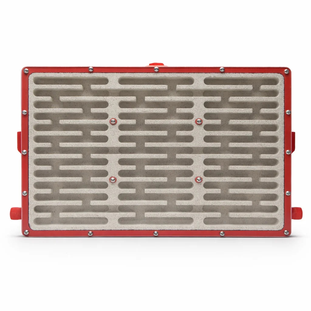Red XL Ytong Nest - Type A viewed head-on, showing the large multi-row grid of straight chambers carved into the Ytong stone