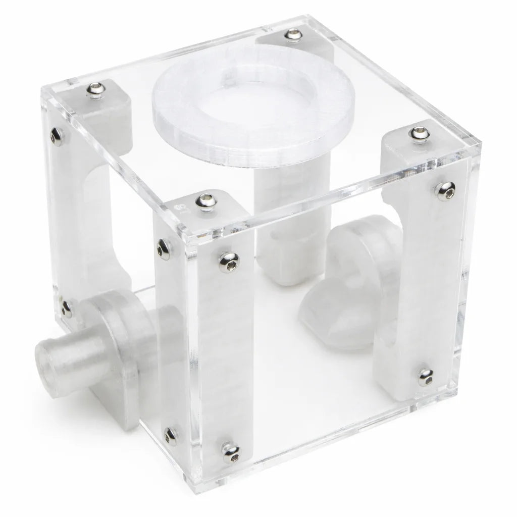 Small Outworld acrylic cube at an angle, showing the white feeding ring insert and water reservoir tube inside