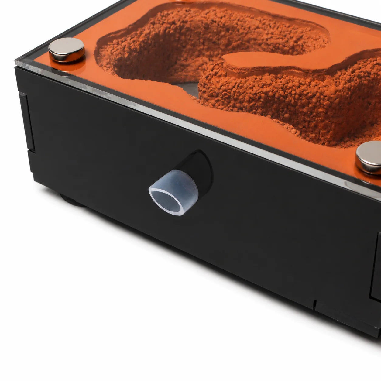 Close-up of the All-In-One Red Gypsum Ant Nest's side hydration port and winding chamber interior