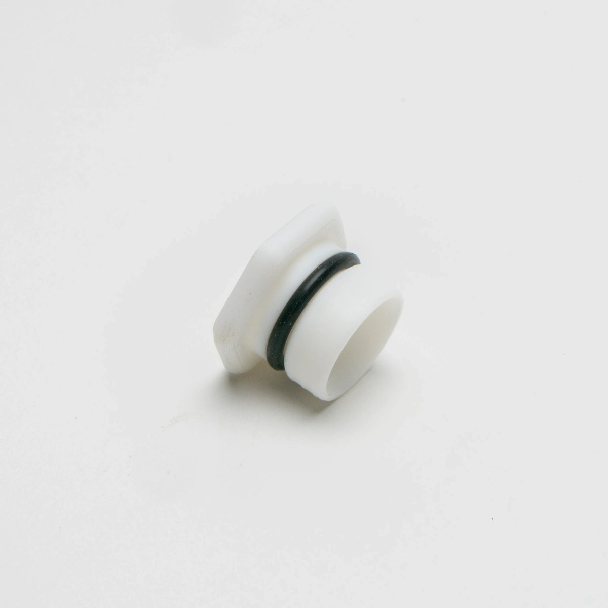 Test Tube Stopper with black O-ring shown at an angle, highlighting the round vented insert